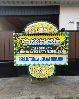 Papan Bunga Duka di Bacukiki Barat